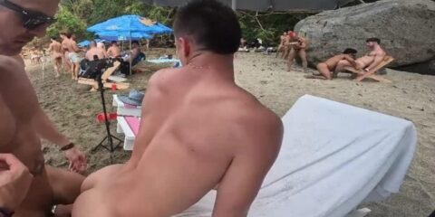 Another view of Austin Wolf fucking Zac Moore on a public beach